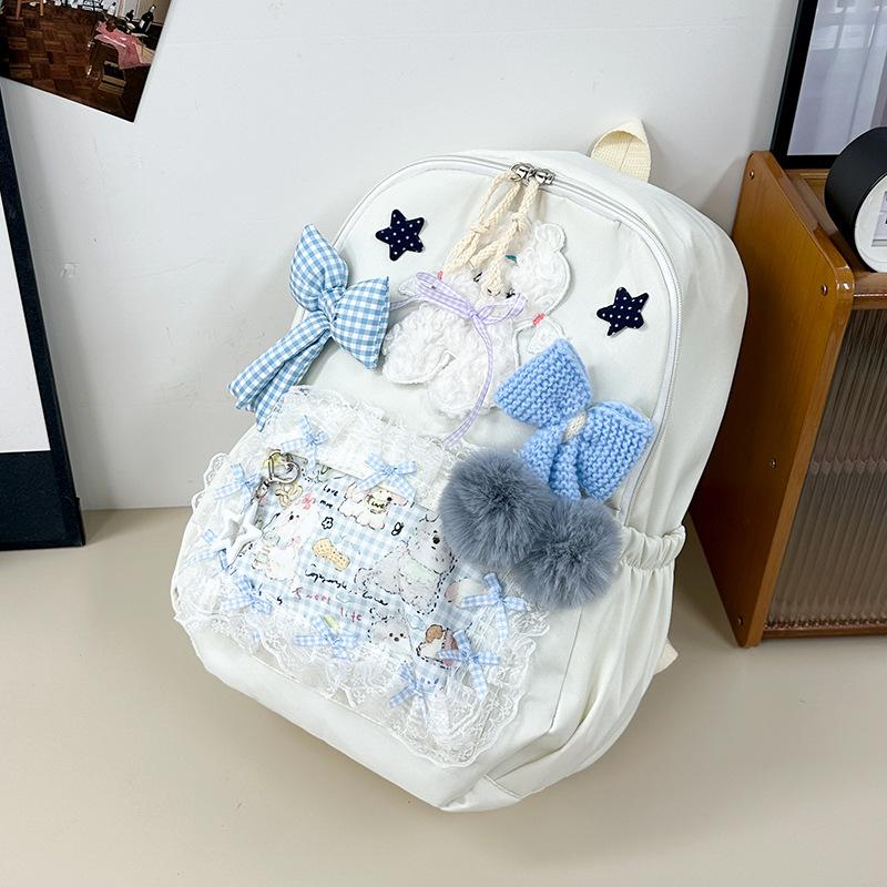 Schoolbag female college style Korean version backpack junior high school cute doll schoolbag outdoor travel backpack schoolbag female junior high