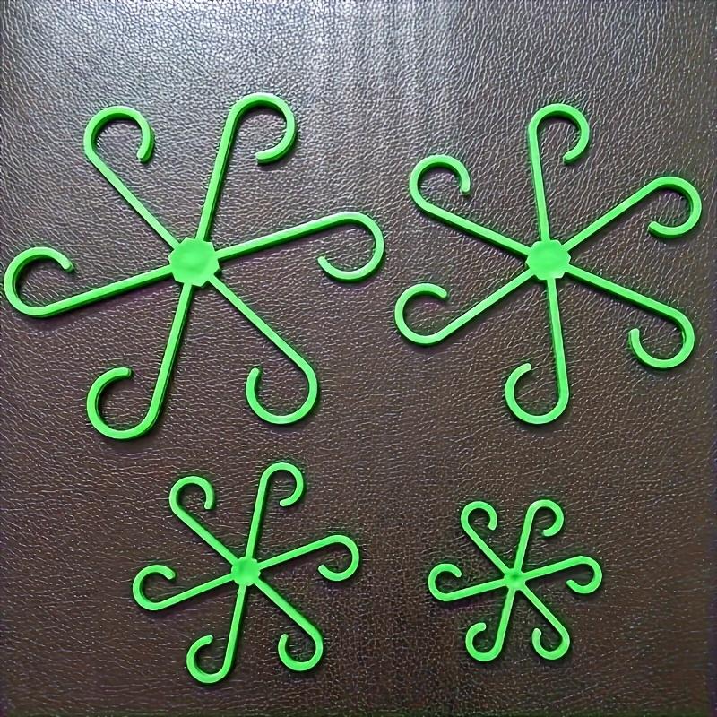 A set of four multi-functional plant support frames for plant growth, suitable for both indoor and outdoor use