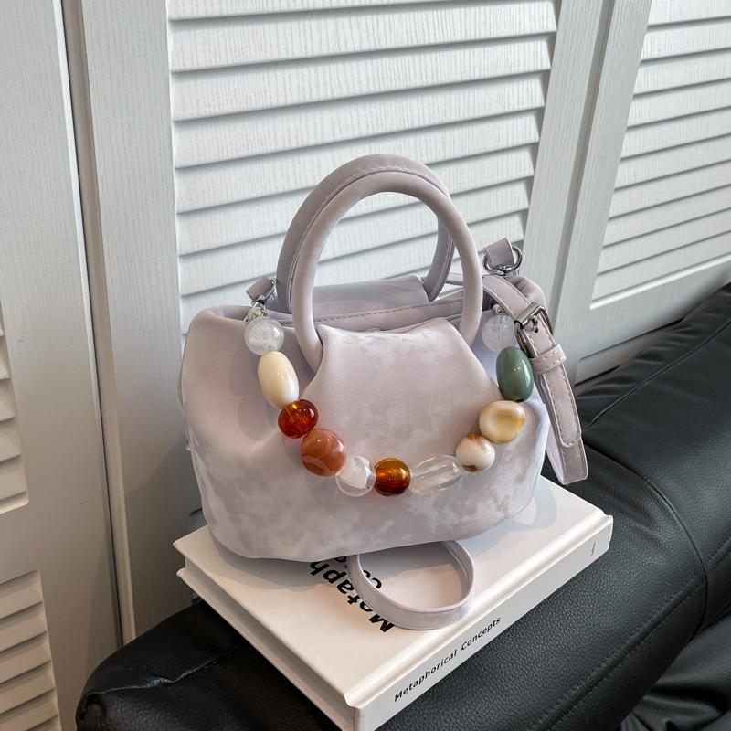 Niche bag women's new summer versatile messenger bag casual pleated portable bucket bag