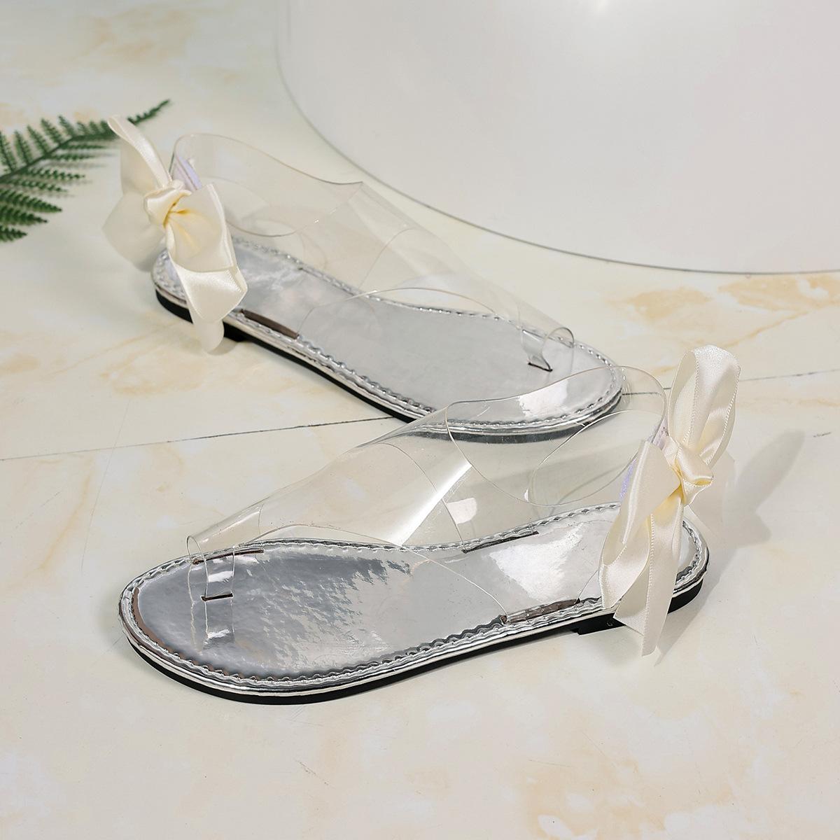 

Модные универсальные цветочные прозрачные плоские сандалии летние новые большие размеры бант с открытым носком женские 36 серебряный