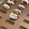 Yunjian Streamer Sweet Wind Niche Design Butterfly Flower Ring Female Enamel Hollow Stacked Ring Tide