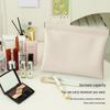 Portable Lipstick Pouch with In-Ear Earphones and Retractable Charger Cable