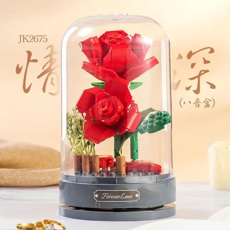 Building blocks music box Clockwork rotating music box Building blocks Rose Lily of the valley puzzle set Valentine's Day gift