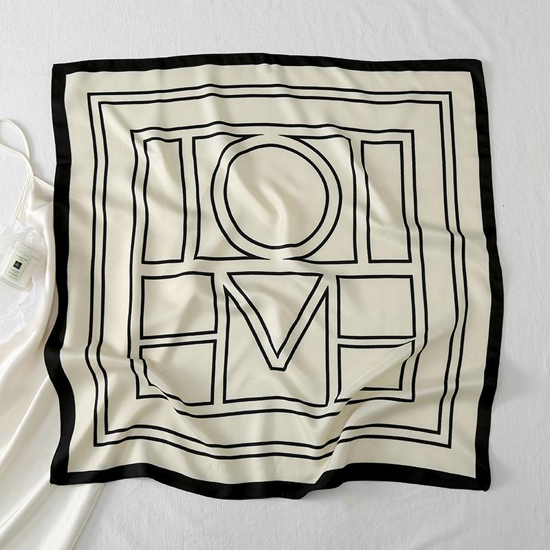 New twill silk niche simple style, classic black and white geometric printing simulation silk square towel sun protection decoration women