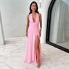 Temperamento di abbigliamento femminile europeo e americano primaverile ed estivo con scollo a V, senza schienale, spacco sexy, allacciatura, abito tinta unita