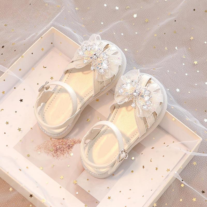 

Girls shoes children s princess bag head sandals 2025 new summer summer crystal baby girl foreign breathable 36