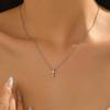 A Delicate And Compact Golden Cross Necklace, an Artistic And Versatile Piece That Highlights The Elegance of The Neck And Unique Taste