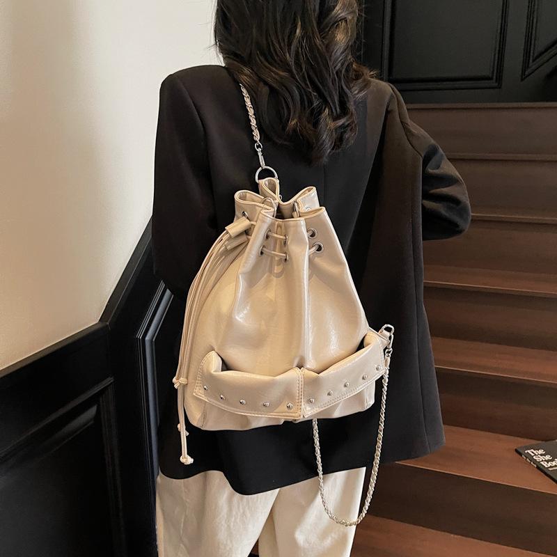 Sweet and delicate pu drawstring women's multi-purpose backpack new commuter versatile shoulder messenger bag