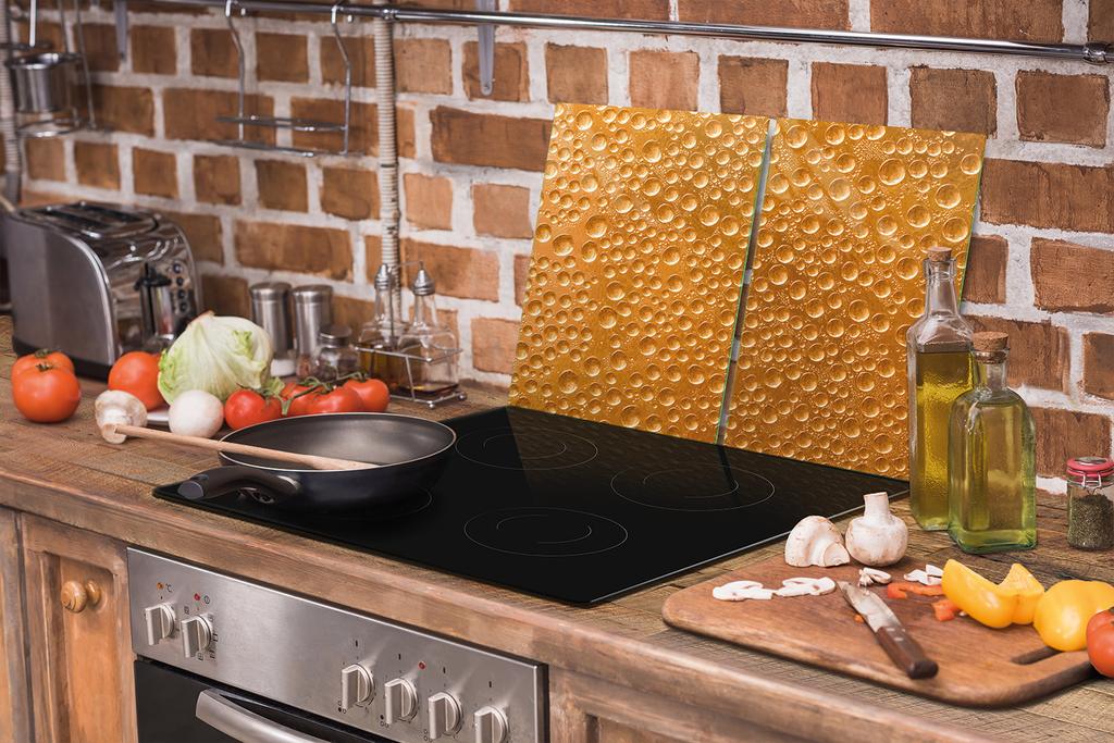 GLAS-KOCHFELDSCHUTZPLATTE 75x52 TROPFEN