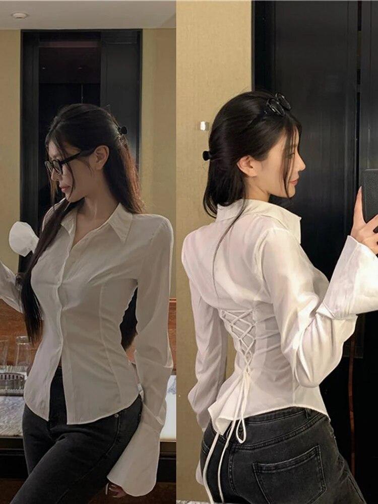 Modedesign Slim Volangslagskjortor Kvinnor Casual Sexig Långärmad Snörning Toppar Kvinnlig Elegant Utställd Ärm Street Enfärgad Skjorta Dam