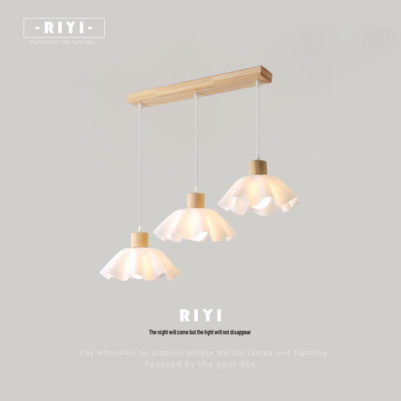 Nordic Modern Wood Art Light: Three-Head Dining Table and Bedroom Lamp in Japanese Wabi-Sabi Style.