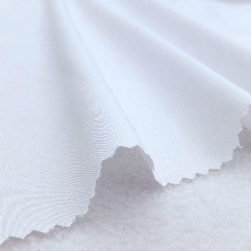 In-Stock 100D Four-Way Stretch Woven Polyester-Spandex Plain Weave Fashion Fabric for Pants and Shirts