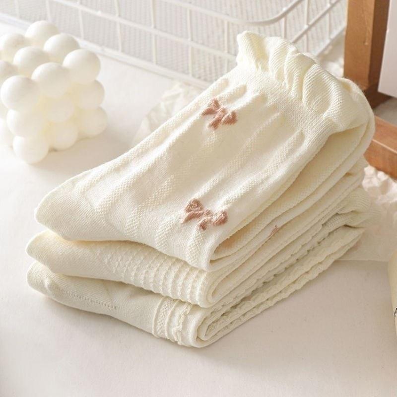 Chaussettes blanches simples, polyvalentes, jolies, nœuds papillon, petites fleurs, chaussettes tube moyennes pour femmes, Kawaii Harajuku Jk Lolita, chaussettes en coton pour filles