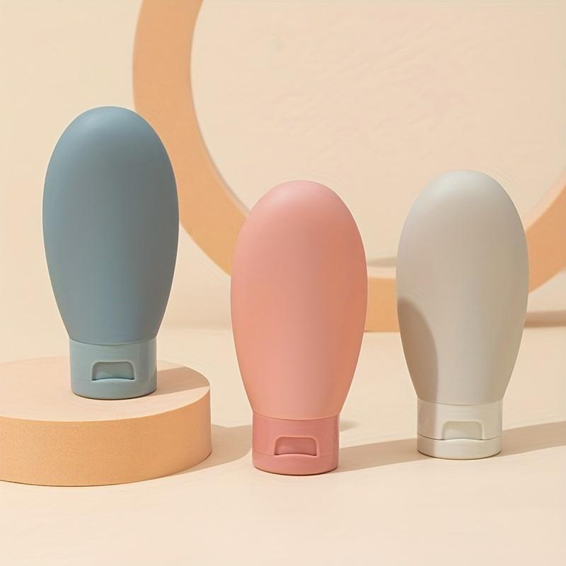 

3Pcs/set 60ml Refillable Travel-Sized Essence Shampoo Shower Gel Bottles,Portable,Containers for On-The-Go Travel and Reusable