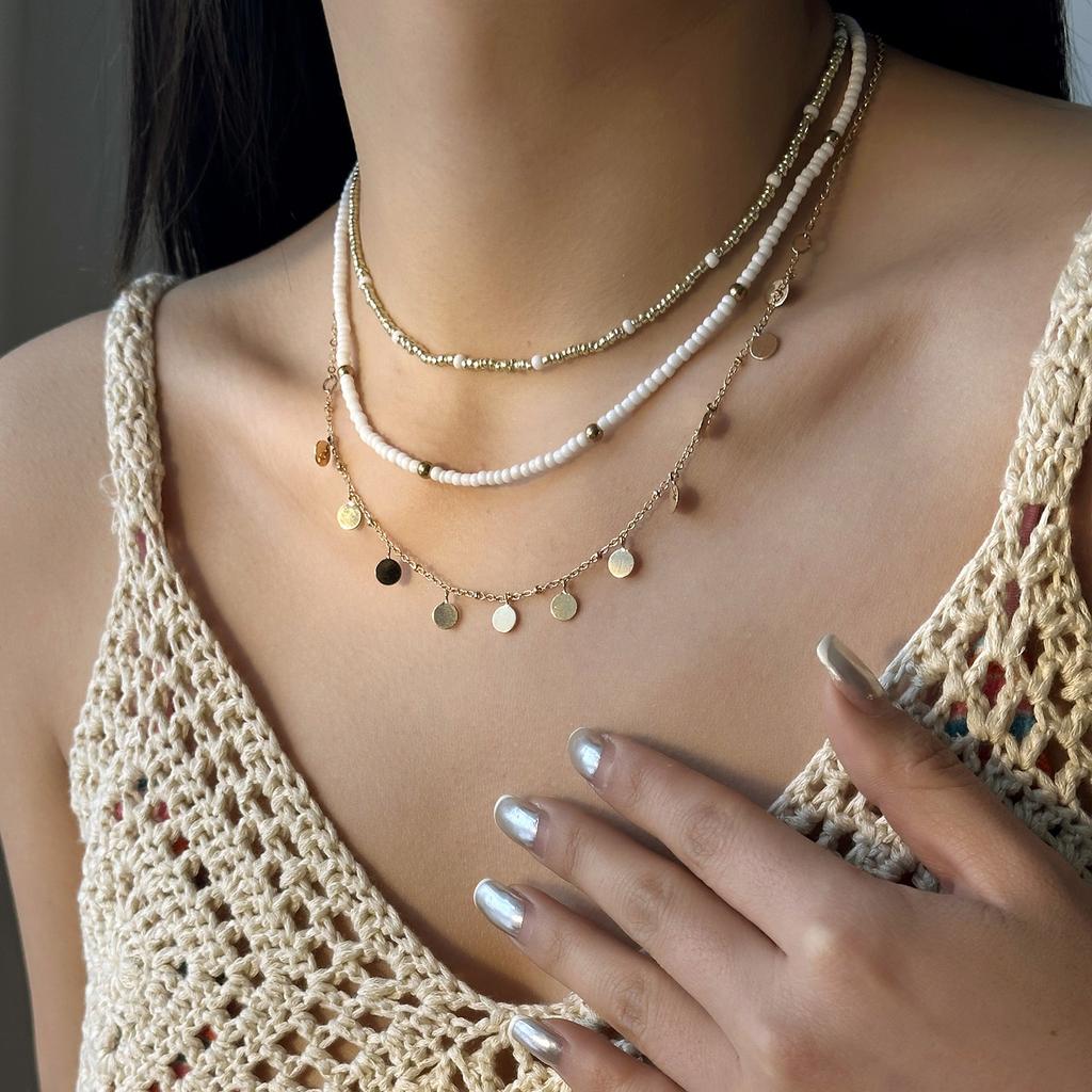 Boho Mehrschichtige Seestern Muschel Reiskorn Perlen Halskette für Damen Vintage Imitation Perlenstein Halskette Sommer Strandparty Schmuck
