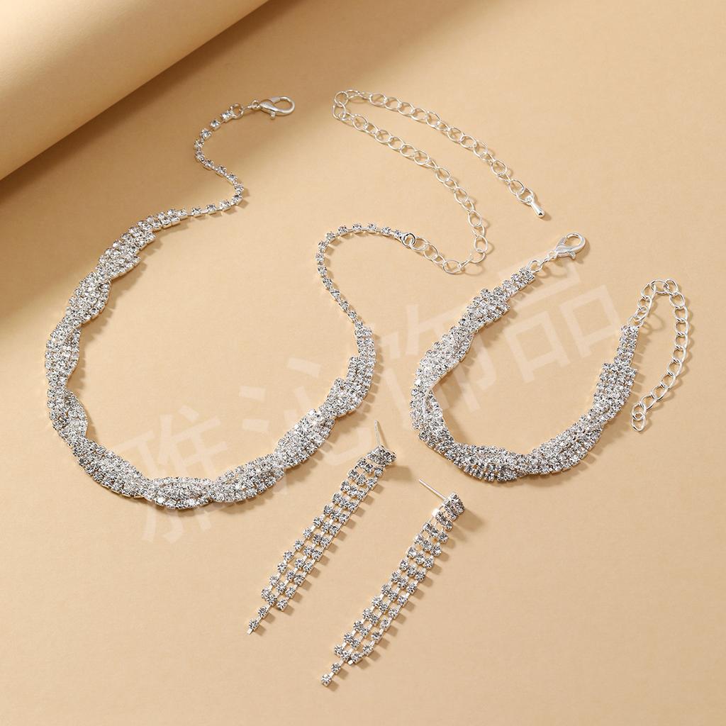 4-teiliges Damenmode-Trend Kupfer Klauenketten Quasten Halskette Ohrringe Armband Zirkon Set Hochzeit Bankett Party Festival Geschenk