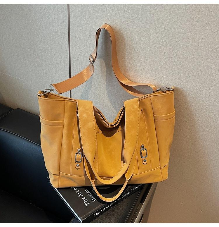 

Корейская версия нишевой сумки-тоут с чувством высокого класса, женская, 2025, модная, простая, с темпераментом, повседневная, для учебы, для работы, сумка-мессенджер, тренд