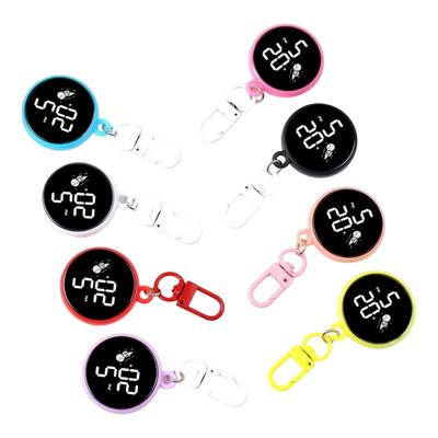 Stylish Round Plastic Keychain With Integrated Electronic Watch Perfect For Fashion Enthusiasts And Busy Commuters