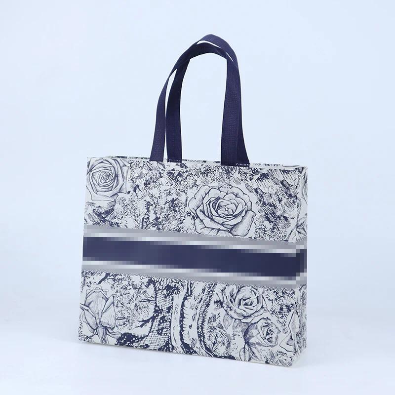 10PCS Rose Printing Packaging Shopping Bag Handle Waterproof Non Woven Fabric Gift Bags Black Clothing Store HandBag