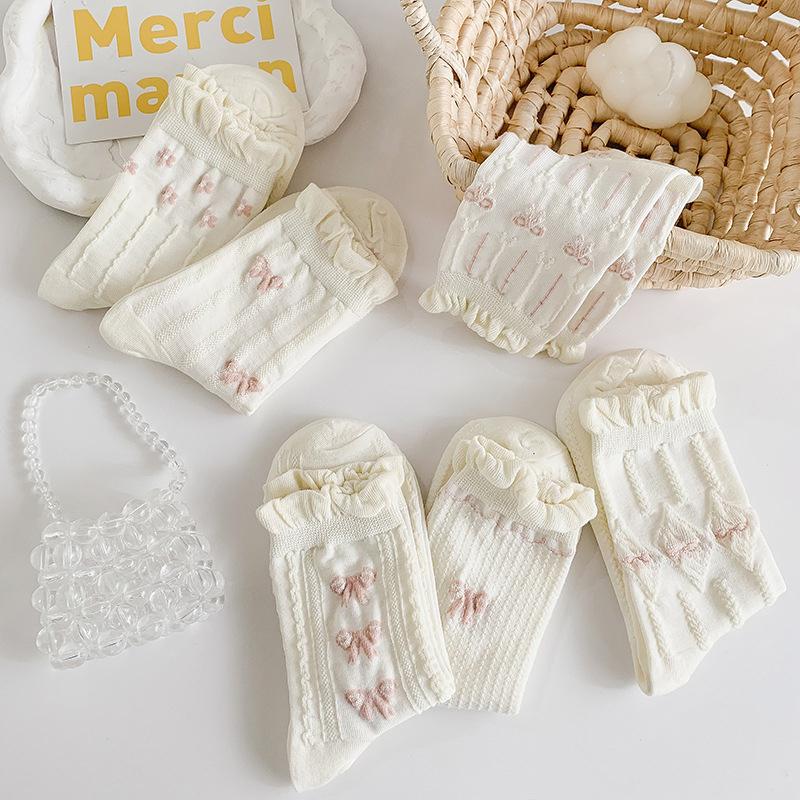 Chaussettes blanches simples, polyvalentes, jolies, nœuds papillon, petites fleurs, chaussettes tube moyennes pour femmes, Kawaii Harajuku Jk Lolita, chaussettes en coton pour filles
