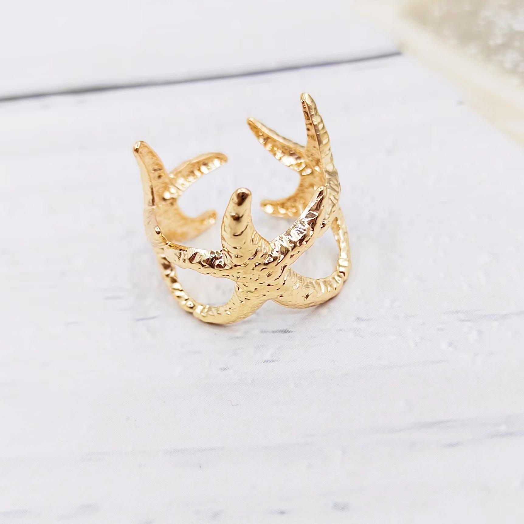 

Браслет-кольцо Ocean Element - Регулируемый дизайн с морской звездой для пляжа