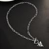Heart Trendy Shape Titanium Steel Necklace Featuring Stylish Black And White Checkerboard Design