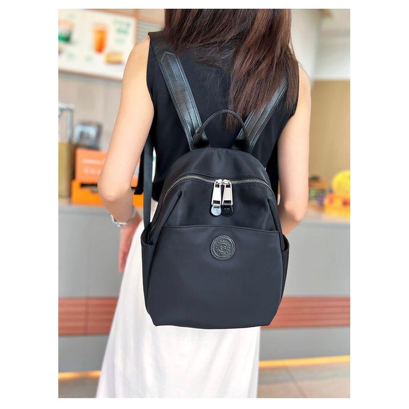 

Рюкзак Женский 2025 Новый Крутой Рюкзак для Поездок на Работу и Путешествий Легкий Модный Дорожный Рюкзак из Ткани Оксфорд Сумка с Высоким Чувством Стиля Black small size (circular)