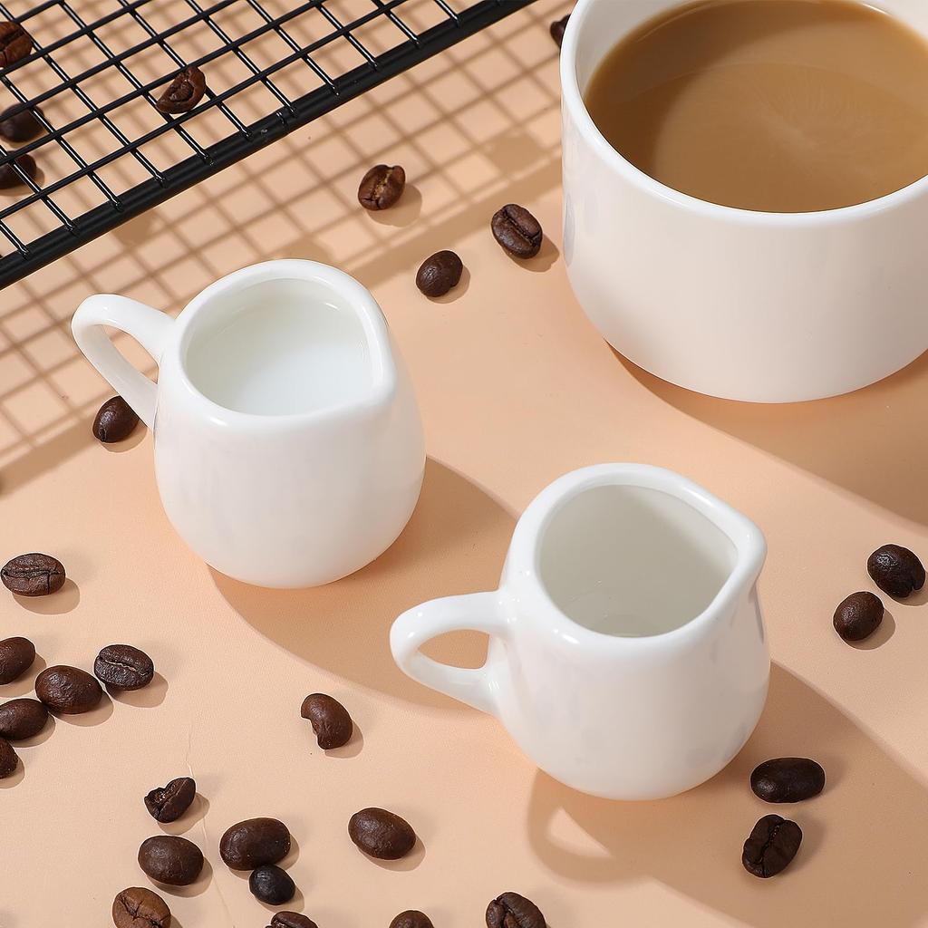 NIYANGLE Mini Milk Pitcher, 50ml, CoffeeMilk Jug, Ceramic White Milk Pot, Pack of 4