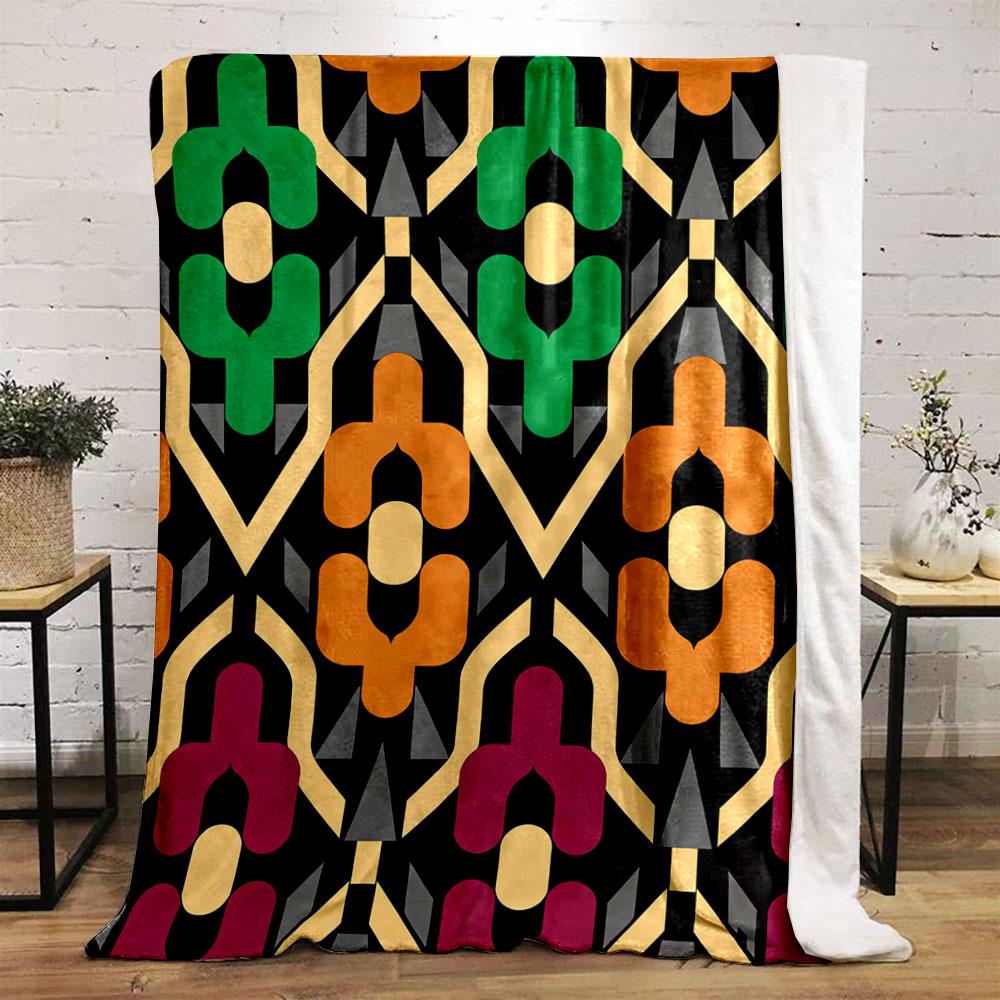 Geometric floral motifs in green, orange, and purple on black background. for all seasons blanket lunch break throw gift