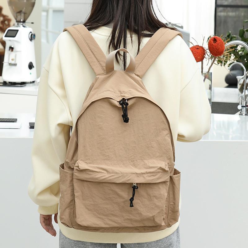 IELGY Japanese casual literary canvas schoolbag, simple washing water and old backpack, khaki fashion nylon backpack.