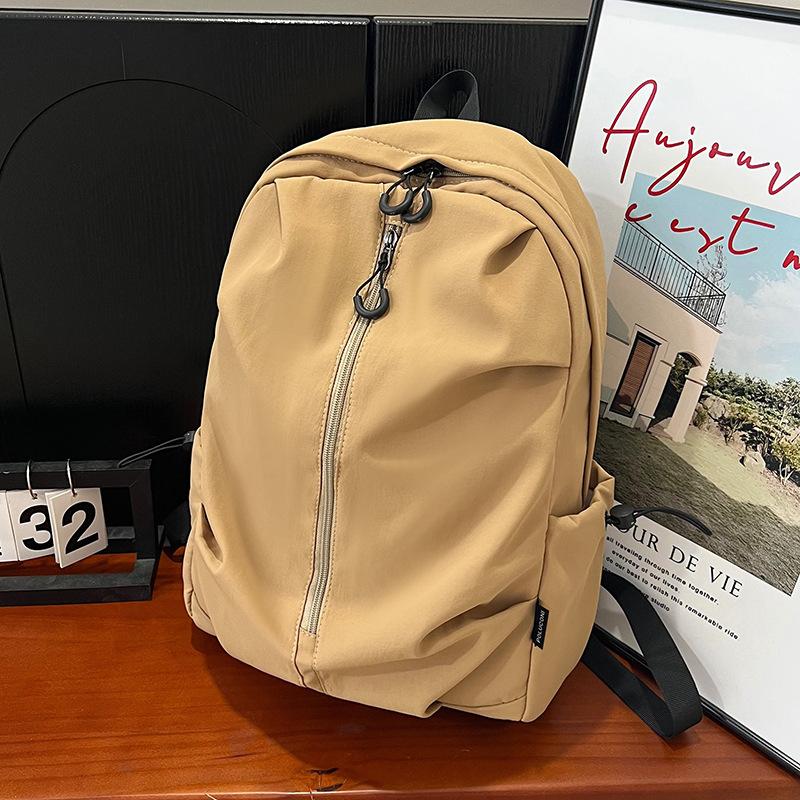 A Trendy and Lightweight Travel Backpack for Middle School Students In A Leisure Campus