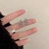 Exquisite Euro-Style Rhinestone Dollar Sign Stud Earrings – Versatile, Luxurious Jewelry for Women.