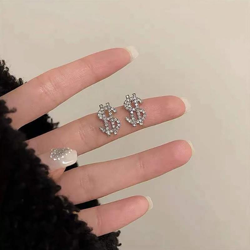 Exquisite Euro-Style Rhinestone Dollar Sign Stud Earrings – Versatile, Luxurious Jewelry for Women.