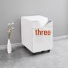 Mobile Three-Drawer Low Cabinet with Lock - Under-Desk or Bedside Storage with External Handles and Rounded Edges.