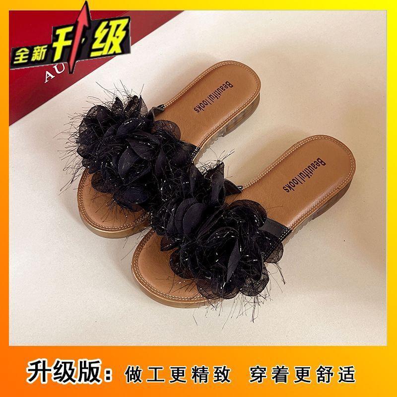 Versatile outer wear flower beach cool slippers women's 2025 summer new beautiful flat flat one-word shoes go out
