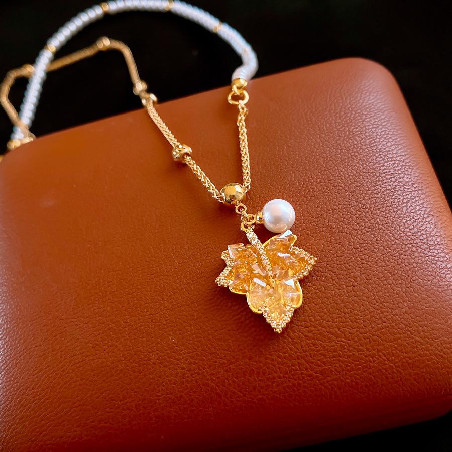 

18K real gold electroplated zircon maple leaf pearl necklace accessories women s design sweater chain accessories