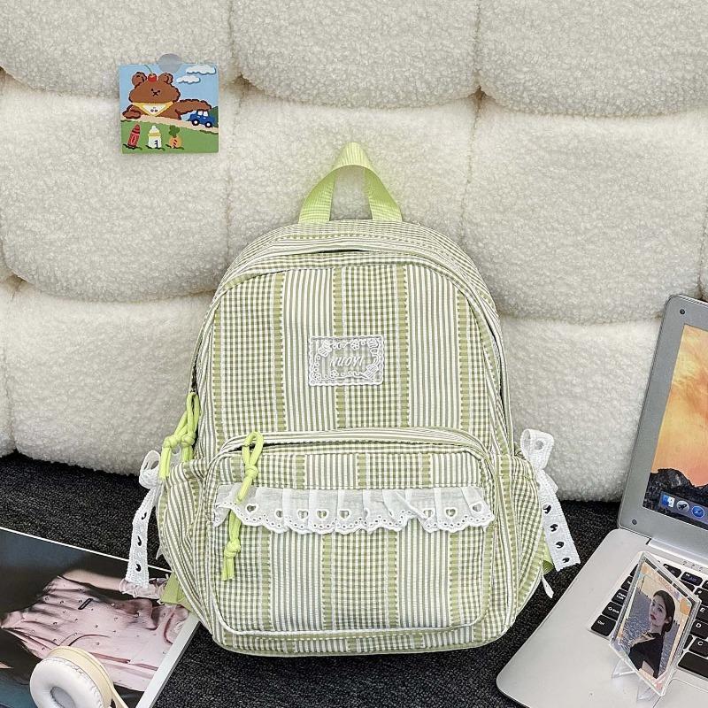 Simple casual striped schoolbag Female junior high school student backpack Large capacity class commuter travel backpack