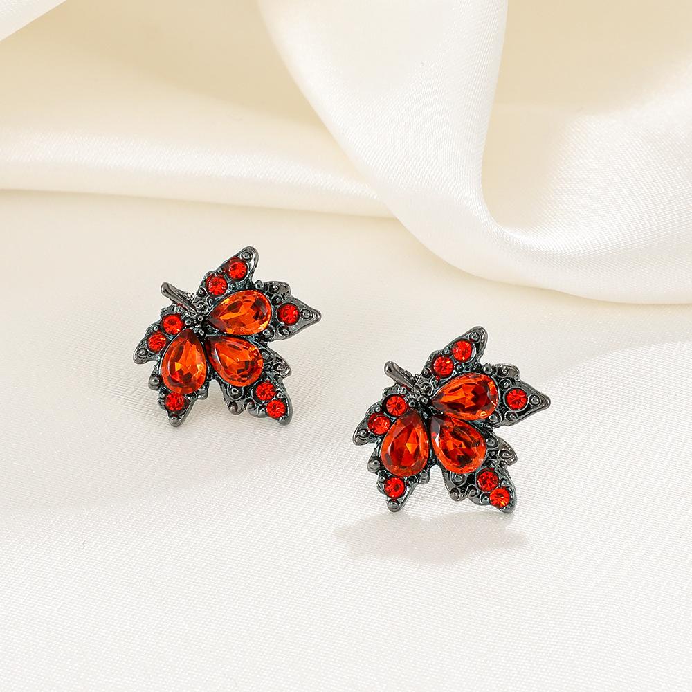 2026 Retro Red Zircon Maple Leaf Stud Earrings – Light Luxury Fashion Jewelry for Women
