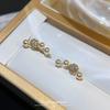 Smile one word simple, raise ear holes, pearl stud earrings, women's niche design, ear clips, light luxury, high-end mosquito coil disc