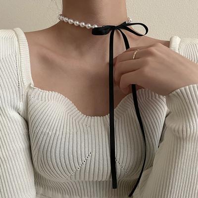 Collana girocollo con fiocco in velluto nero dolce coreano da donna Bowknot perle imitazione clavicola gioielli con colletto a catena