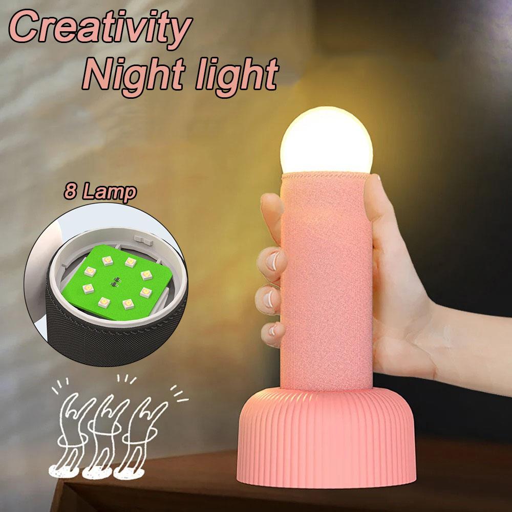 Interest Handheld Night Light Creative LED Sleeping Lamp Original Design Unique Switching Method Has A Base for Placing on Table