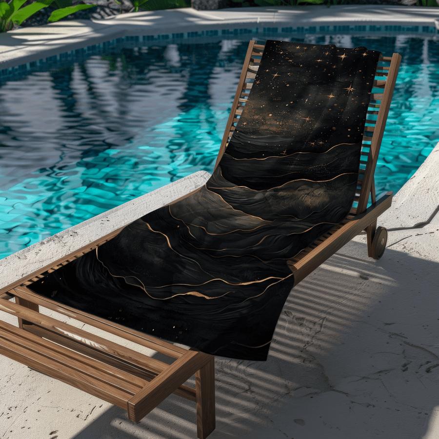 Black and gold starry sky and galaxy patterned beach towel, made of polyester, machine washable, perfect for travel and pool use