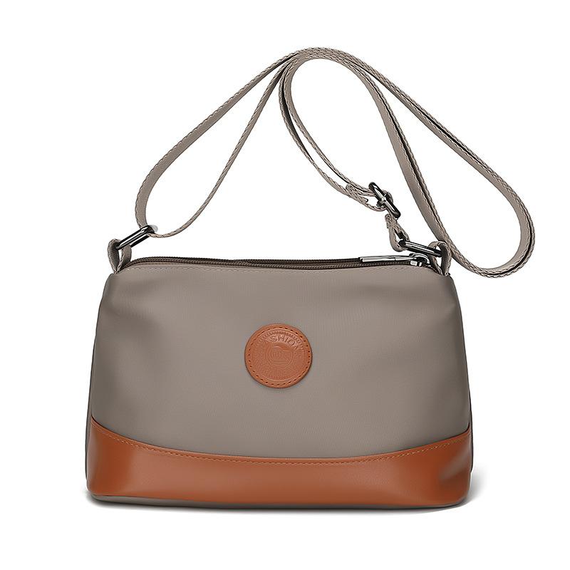 

Contrasting colors trendy women s bags new casual and light commuting Oxford cloth shoulder bag three-layer large-capacity messenger bag хаки