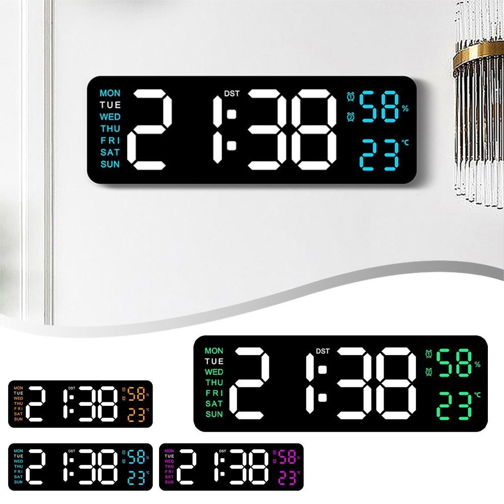 Multifunctional electronic clock that can be hung or stood as an alarm clock