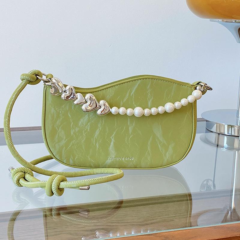 

New popular casual and beautiful personalized messenger bag niche design bag women s 2024 summer shoulder armpit bag зелений