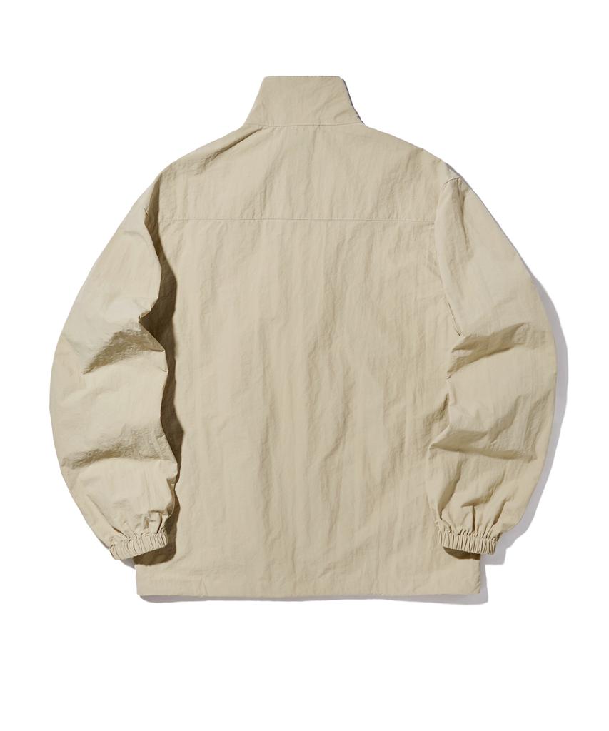 Slit Studio Lettering Windbreaker Jacket Beige