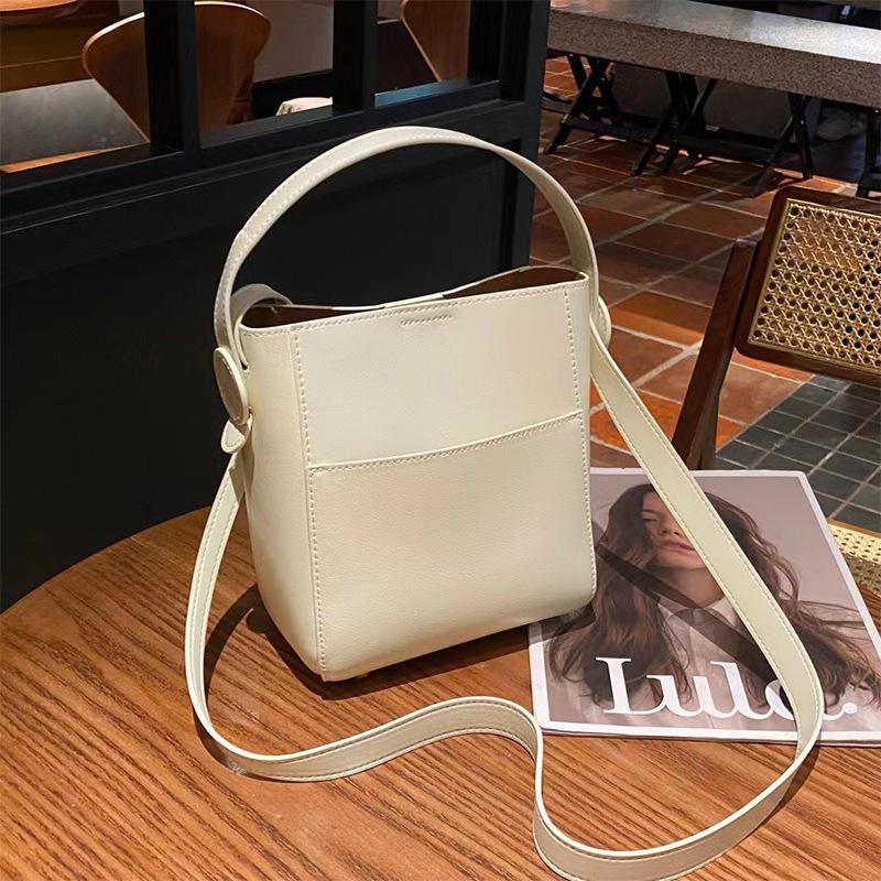 

Hong Kong Style Women s Retro Genuine Leather Bucket Bag Cowhide Commuter Mini Women s Bag Single Shoulder Crossbody Underarm Bag 18*20*10 бежевий