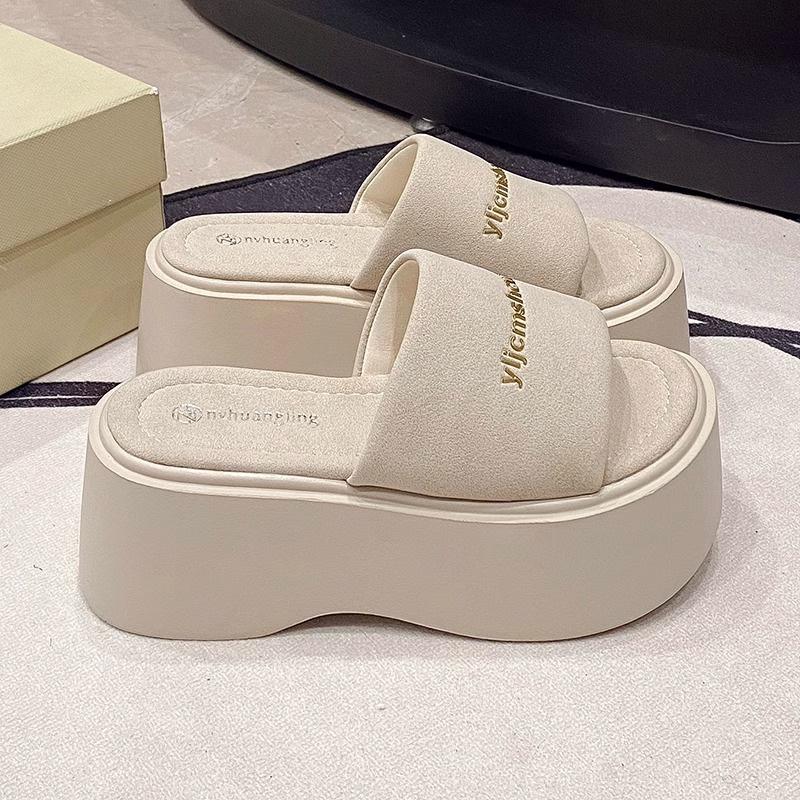 Wedge heel muffin thick-soled one-word cool slippers women's new soft-soled casual outer wear light beach shoes in summer 2025