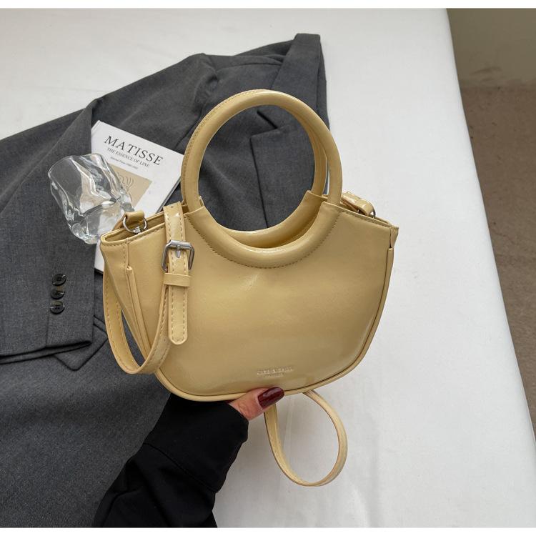 

В этом году популярная маленькая женская универсальная сумка 2025 новая повседневная корейская версия сумка-мессенджер популярная портативная сумка-ведро