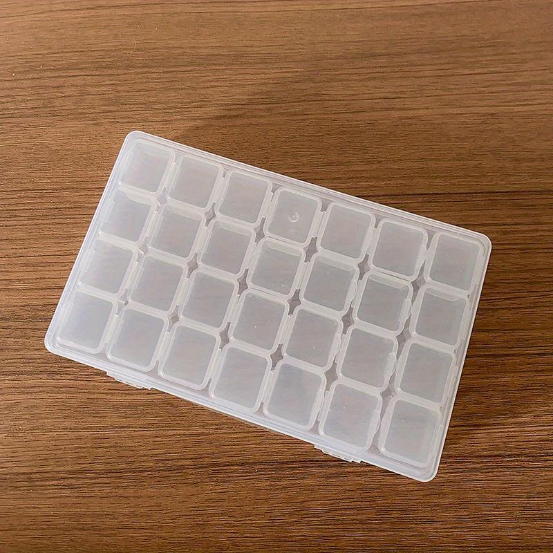 A Transparent Plastic Jewelry Box with 28/56 Compartments for Storing Earrings, Beads, and Crafts.